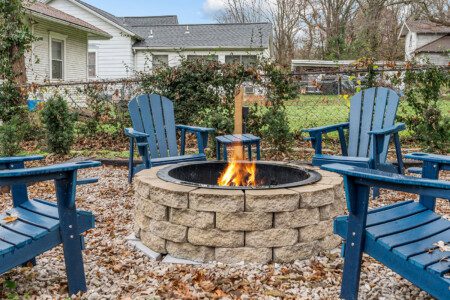 cairo st bungalow backyard fire pit adirondack chair