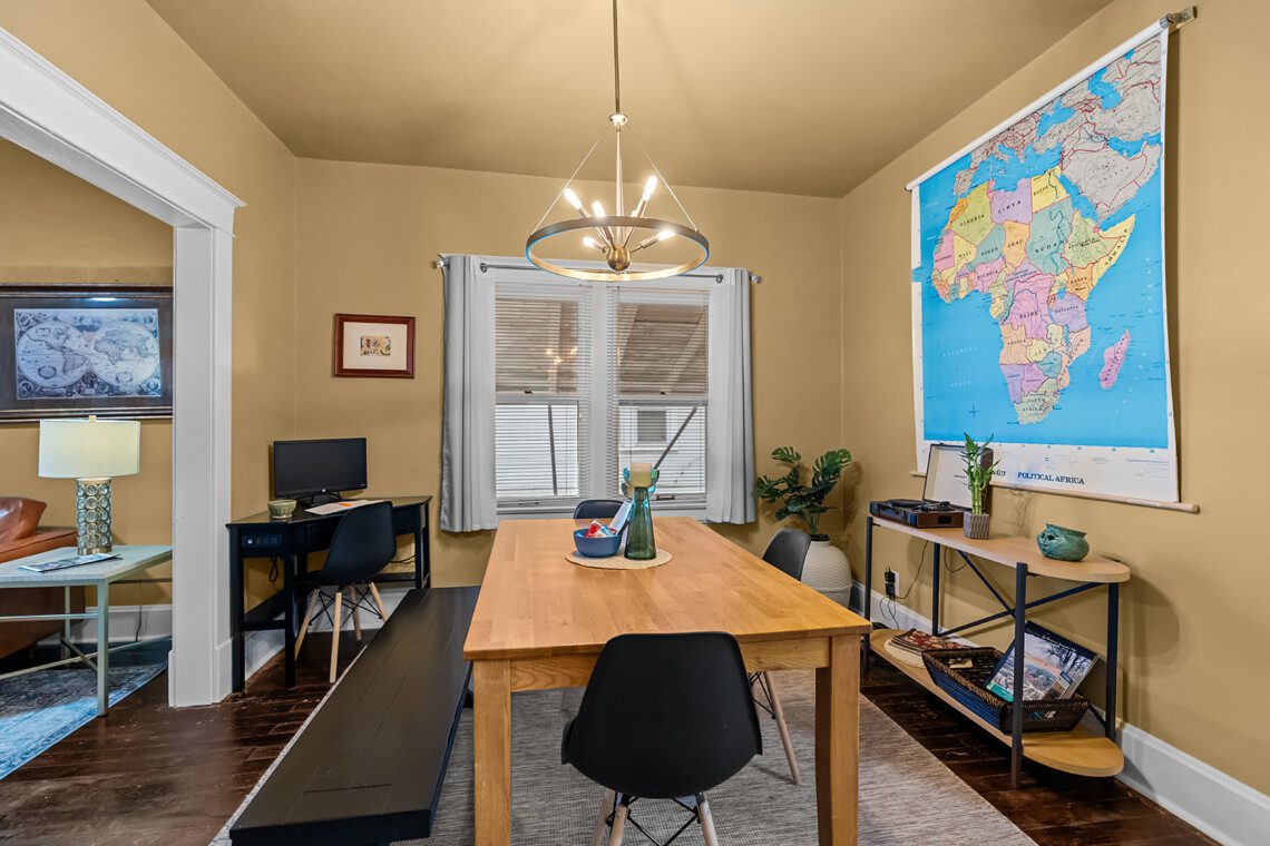 cairo st bungalow dining room work space map decor