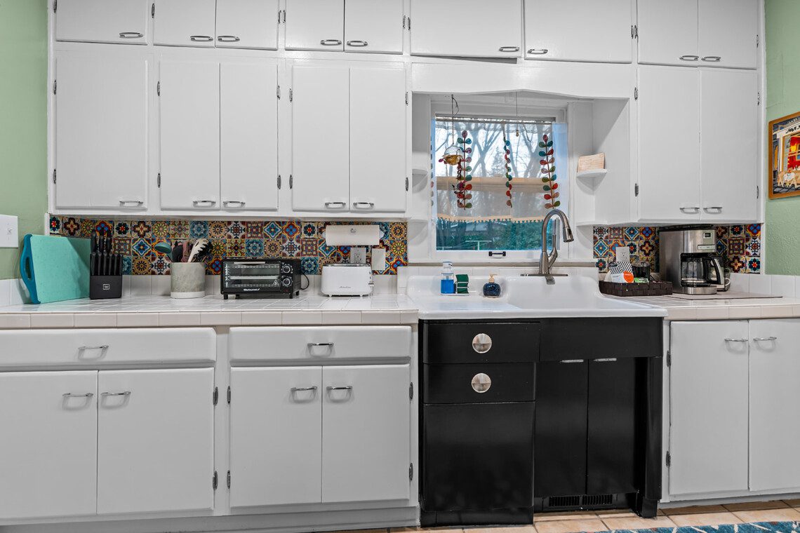 cairo st bungalow kitchen colorful tile backsplash